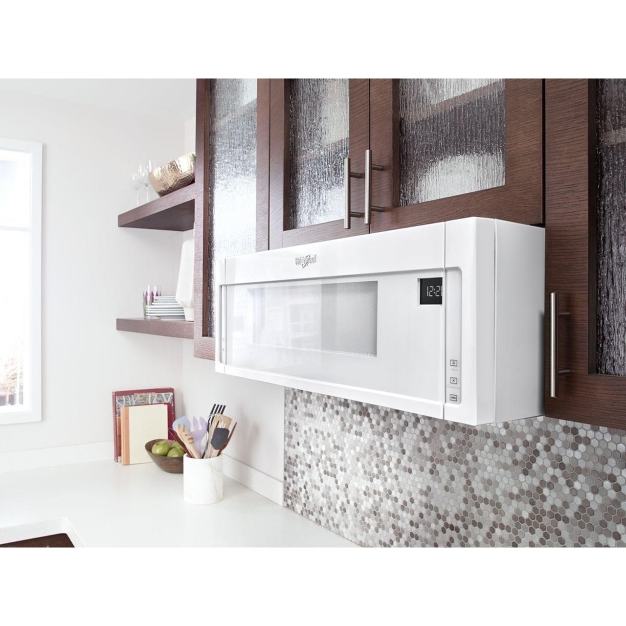 Low profile over outlet the stove microwave